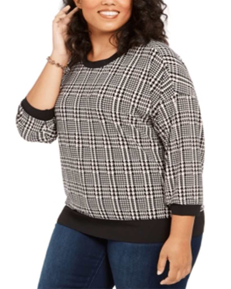 Front of a model wearing a size 2XL Tommy Hilfiger Women's Plus Plaid Sweater Black Size -2XL in Black by Tommy Hilfiger. | dia_product_style_image_id:314444